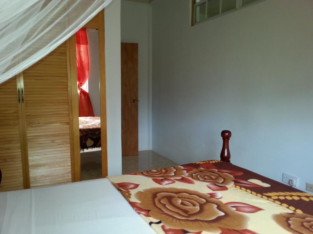 Corosol Apartments Roseau Szoba fotó